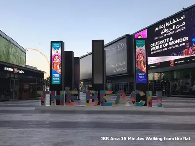 a sign in the middle of a shopping center at Studio - Dubai Marina - Partial Marina View Z1104 in Dubai