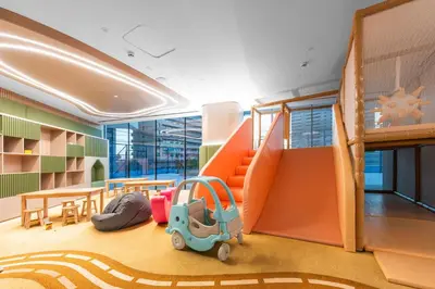 a childrens room with a bunk bed and play equipment at StayShort - Modern 1 Bedroom with Private Jacuzzi in JVC that Sleeps 2 in Dubai