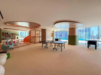 a room with a ping pong table in a building at GuestReady - Luxe Stay with Private Pool in Dubai