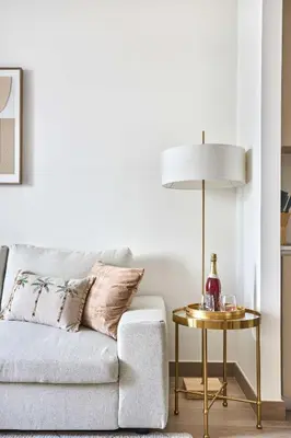 a living room with a couch and a table at Frank Porter - Grove at Creek Beach Building in Dubai
