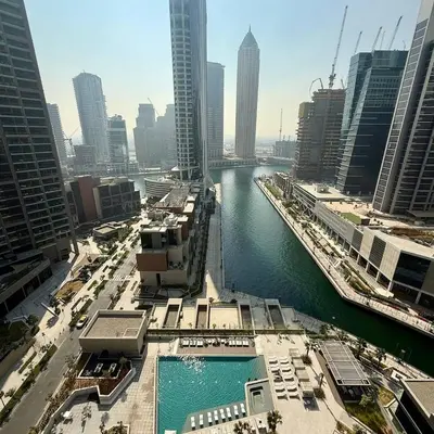 a view of a river in a city with buildings at Luxurious view of the Business Bay canal, 2 beds in Dubai