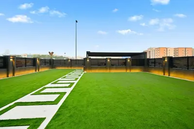 a field of grass on the roof of a building at 5 BR Villa Near Business Bay By Petals Holiday Homes in Dubai