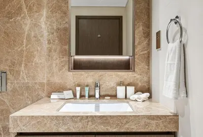 a bathroom with a sink and a mirror at Luxury one bed flat in Dubai Harbour in Dubai