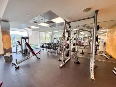 a gym with a lot of equipment in a building at PVH - Acacia C - Spacious 1BR with Direct Dubai Hills Park Access in Dubai