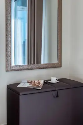 a mirror on top of a dresser in a room at GlobalStay Luxury Apartments The Residences Tower 8 Downtown Dubai in Dubai