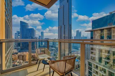 a balcony with chairs and a view of the city at GlobalStay Luxury Apartments The Residences Tower 8 Downtown Dubai in Dubai