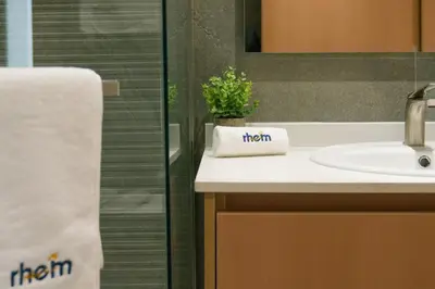 a bathroom with a sink and a shower at Brand New 1-BR with Marina and JLT Balcony Views in Dubai
