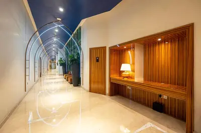 a hallway of a building with a hallwayngth at Premium Studio Burj Khalifa & Canal View in Dubai