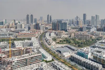 an aerial view of a city with tall buildings at Binghatti House, JVC - 1 Bedroom Apartment - Allsopp & Allsopp in Dubai
