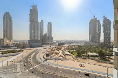 a view of a city with tall buildings at VayK - Elegant Canal-Front 1 BD in a Prime Location in Dubai