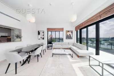 a living room with a couch and chairs and a table at Vida The Hills Residences, Dubai in Dubai