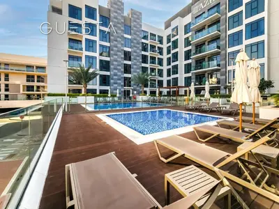 an image of a swimming pool in a building at Azizi Greenfield, Meydan Dubai in Dubai