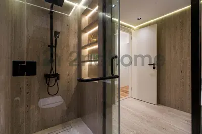 a shower with a glass door in a bathroom at Luxurious Newly Furnished 2 Bed in Dubai Marina in Dubai