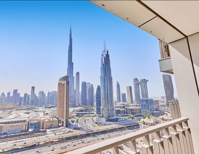 a view of the dubai city from a balcony at Spacious Luxury Apartments at Burj Vista with Direct Burj Khalifa Views in Dubai