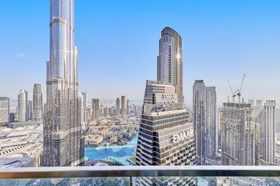 a view of a city skyline with tall buildings at Burj Khalifa View Apartments, Burj Vista Tower - Downtown in Dubai
