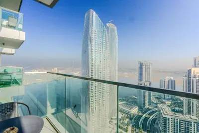 a view of a city from the top of a building at TRPS - The Grand, Dubai Creek Harbour - Luxury High-Floor 1BR, Creek & Skyline View in Dubai