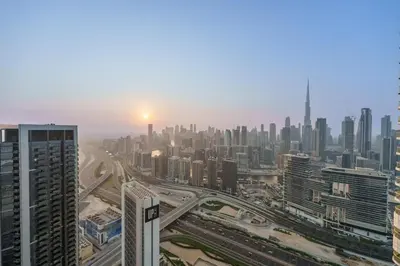 a view of a city from the top of a skyscraper at HSHOME - Luxury 3 Bedroom Apartment with Burj Khalifa & Stunning Skyline View in Dubai