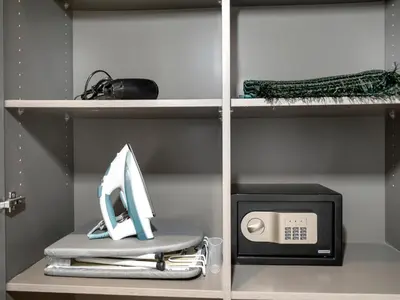 a computer monitor sitting on top of a microwave at Large modern STUDIO in STERLING DOWNTOWN I DUBAI MALL I Sleeps 4 I Amazing Balcony in Dubai