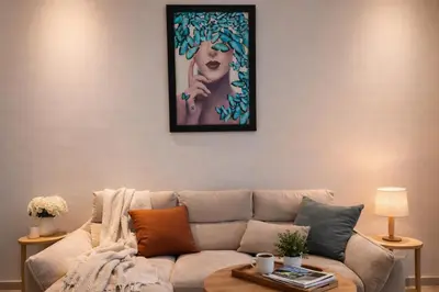 a living room with a couch and a painting on the wall at Near World Trade Center Sleeps 5 Family Business Friendly in Dubai