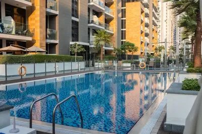 a swimming pool in the middle of a building at Large Beautiful One Bed Downtown Dubai in Dubai