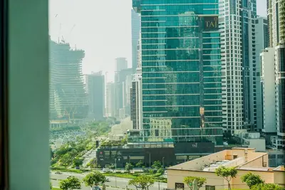 a view of a city with tall buildings at TRPS - Burj Crown, Downtown - Skyline and Pool View, Furnished, Downtown in Dubai