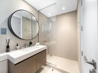 a bathroom with a sink and a mirror at Luxury 4BR Villa in Arabian Ranches 3, Resort-Style Living with Private Garden & Hot Tub in Nadd Shubayḩ