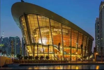a large building with a face on the front of it at Downtown Three Beds near to Burj Khalifa and Dubai Mall in Dubai