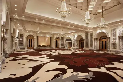 a large room with a large carpet with animals on it at Al Habtoor Palace - Preferred Hotels & Resorts in Dubai