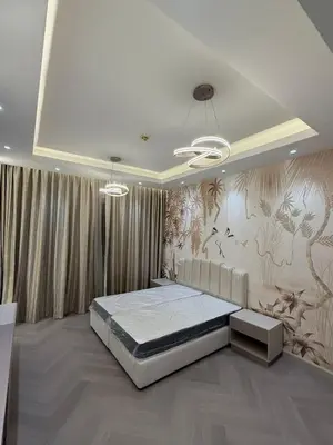 a bedroom with a bed in the middle of the room at 403,1 BHK lake View, V3 tower, JLT Royal Montania in Dubai