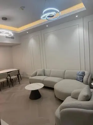 a living room with a couch and a table at 403,1 BHK lake View, V3 tower, JLT Royal Montania in Dubai