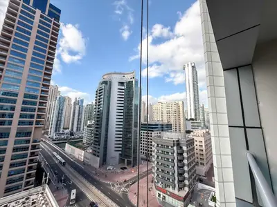 a view of a city skyline from a building at StayShort - Stlylish 2 Bedroom in Dubai Marina that Sleeps 4 Near Metro in Dubai