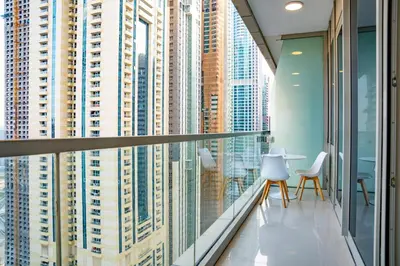 an office balcony with views of skyscrapers at Modern and Stylish 2-BR High Floor All Bills Included in Dubai