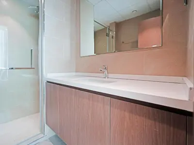 a bathroom with a sink and a mirror at Elegant 1-Bedroom Apartment in Al Furjan-G01 in Dubai