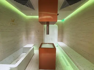 a room with a bench and a box in it at Premium Luxury 2BR Business Bay - Valet parking, Pool, Gym, SPA and Ice room in Dubai