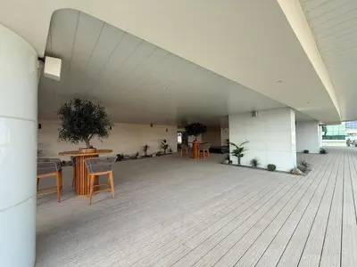 a room with a table and chairs in a building at Premium Luxury 2BR Business Bay - Valet parking, Pool, Gym, SPA and Ice room in Dubai