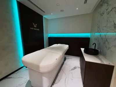 a bathroom with a white toilet and a sink at Premium Luxury 2BR Business Bay - Valet parking, Pool, Gym, SPA and Ice room in Dubai