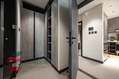 a glass door leading to a kitchen in a house at High Floor With Full Lake View in Dubai