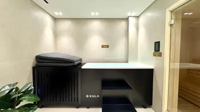 a room with a counter with a bag on top at Cozy Studio with Balcony and Jacuzzi I Near Dubai Mall & Downtown I Sleeps 4 in Dubai