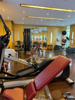 a gym with several exercise bikes in a room at Fully Luxury Studio Total Privacy Pool & Sauna in Dubai