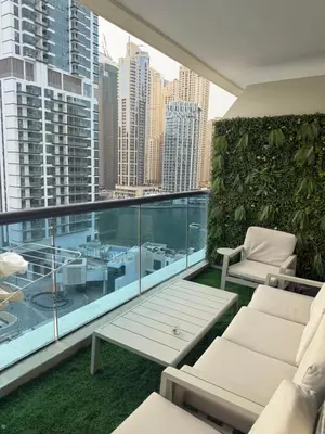 a balcony with a view of a city skyline at Marina 1 Bedroom appartment in Dubai