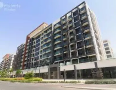 a large apartment building with a lot of windows at Luxury Studio big Balcony in Dubai