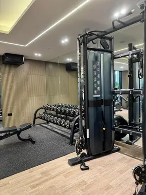 a fitness room with a gym with tread machines at The Residences in Dubai