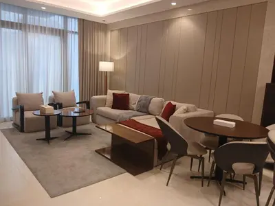 a living room with a couch and a table at Luxury 1BHK Apartment Nobles Tower, Business Bay in Dubai