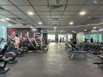 a gym with many chairs and people in a room at Spacious 2BR Apartment-Marina Walk Luxury Stay-Enjoy Dubai Marina Views in Dubai