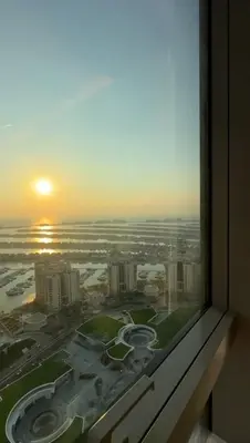 a view of a city from a window in a building at PALM TOWER by Design Studio 1 BR in Dubai