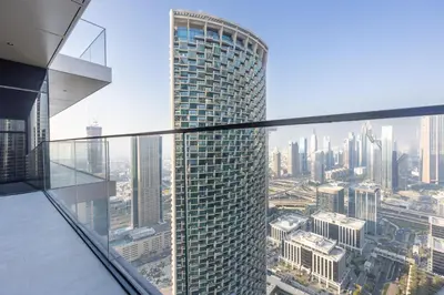 a view of a city from the top of a skyscraper at 3br on the 49th floor of Address Opera in Dubai