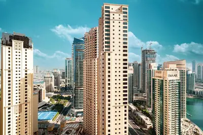 a view of a large city with tall buildings at Stunning 2BR with Sea View Murjan 1 Near Beach in Dubai