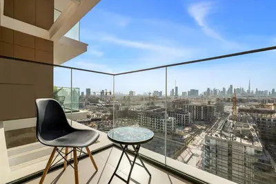 a balcony with a view of the city from a building at Luxury 2BR with Burj Khalifa View in Port Rashid in Dubai