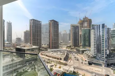 a view of a city with tall buildings and traffic at Chic Studio in Peninsula Three, Business Bay in Dubai
