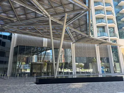a view of a building with a metal roof at Chic Studio in Peninsula Three, Business Bay in Dubai